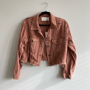 Distressed denim jacket